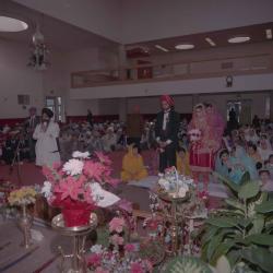 [Group photo of Gurdev S. Brar, an unidentified bride and wedding guests]