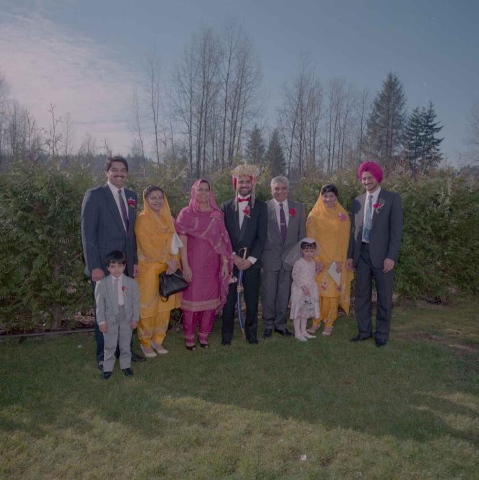 [Photo of Harjinder Gill, Wendy Grewal and the wedding guests]