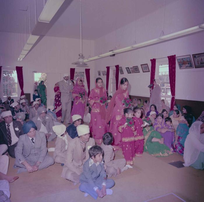 [Photo of Kamaljeet Grewal and the wedding guests]