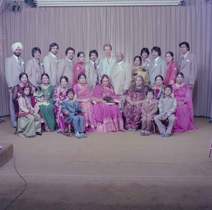 [Group portrait of David Gill, Kamaljeet Grewal and wedding guests]