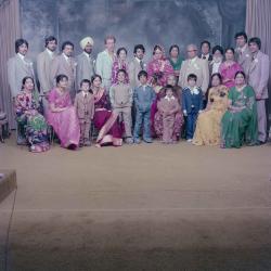 [Group portrait of David Gill, Kamaljeet Grewal and wedding guests]
