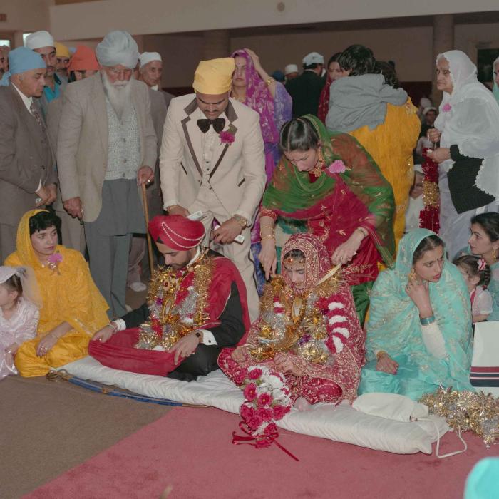 [Photo of Harjinder Gill, Wendy Grewal and the wedding guests]