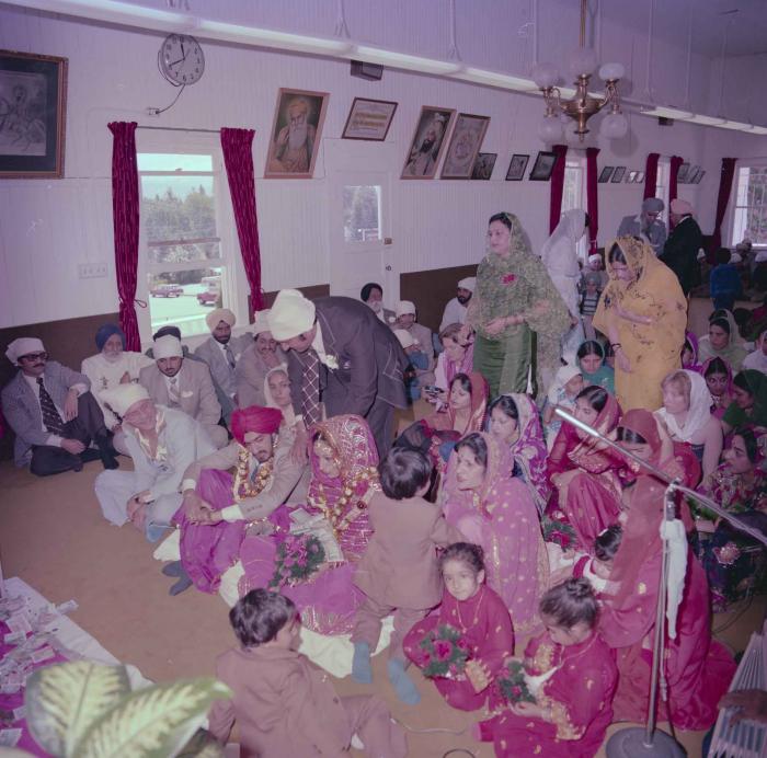 [Photo of David Gill, Kamaljeet Grewal and the wedding guests]