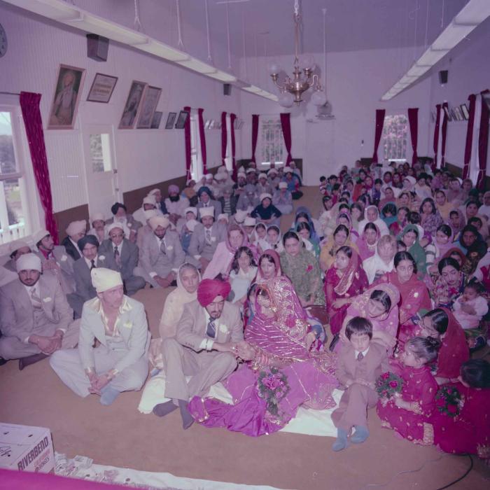 [Photo of David Gill, Kamaljeet Grewal and the wedding guests]