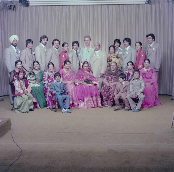 [Group portrait of David Gill, Kamaljeet Grewal and wedding guests]