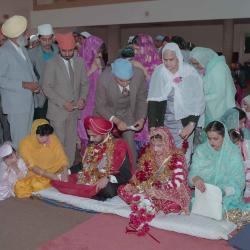 [Photo of Manpreet Brar and wedding guests]