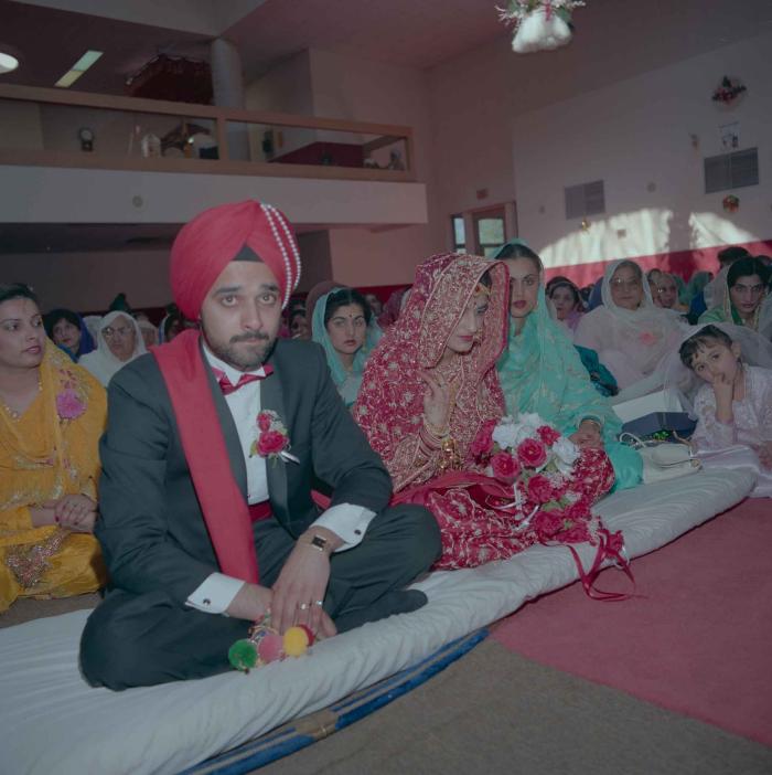 [Photo of Harjinder Gill, Wendy Grewal and the wedding guests]