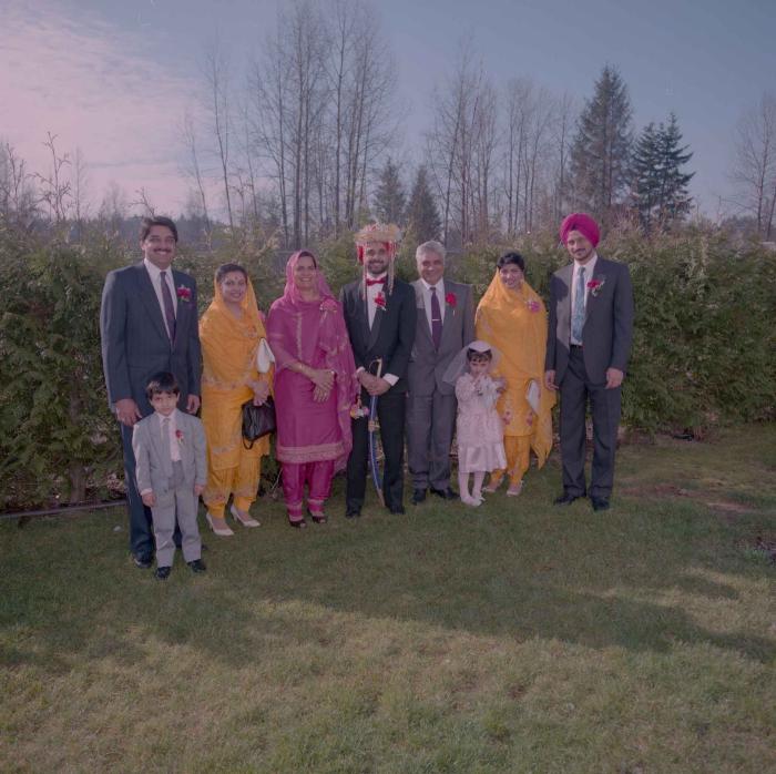 [Photo of Harjinder Gill and the wedding guests]