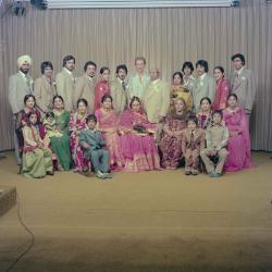 [Group portrait of H.S. Dhaliwal and an unidentified bride]