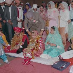 [Photo of Manpreet Brar and wedding guests]