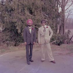 [Photo of Baljinder Gill and an unidentified man]