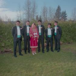 [Photo of Wendy Grewal and five unidentified men]