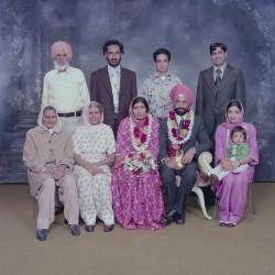 [Group portrait of Darshan Dhaliwal, an unidentified woman and two unidentified children]
