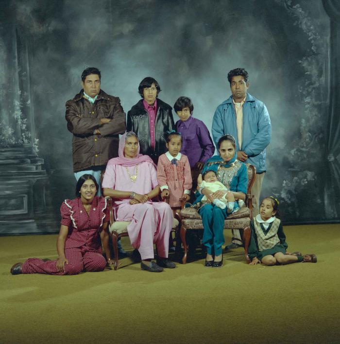 [Group portrait of two unidentified men, two unidentified women and six unidentified children]