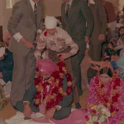 [Photo of Baljinder Gill, Gurcharah Dhaliwal and the wedding guests]