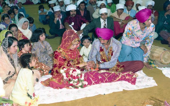 [Group photo of Ajmar Singh Bapari and Sandhu Avdar sitting for Roka]