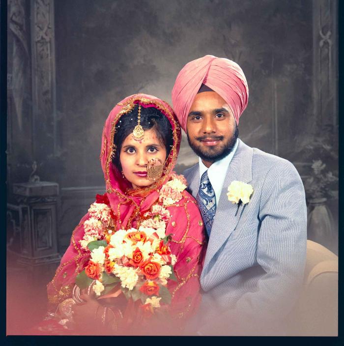 [Portrait photo of Braich and unidentified  bride]