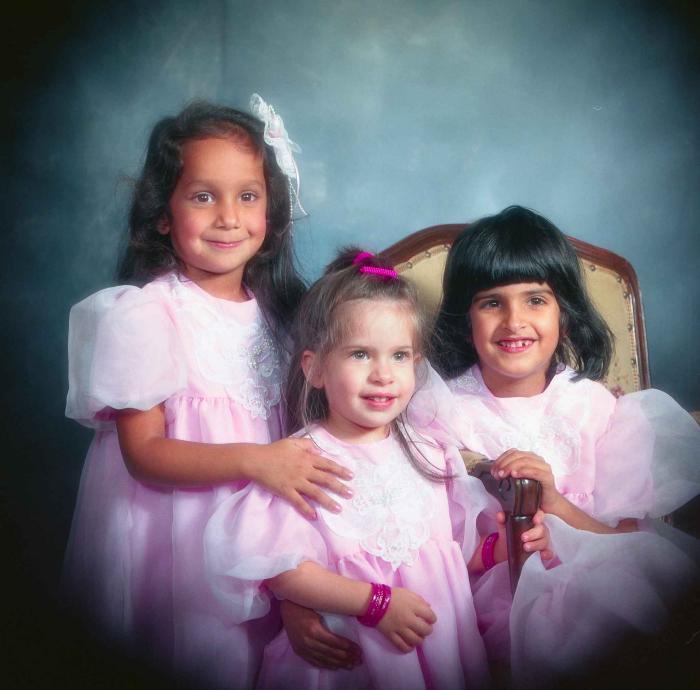 [Portrait of three unidentified children]