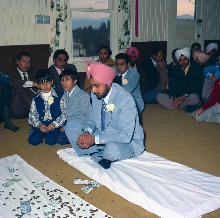 [Group photo of Braich and wedding guests]