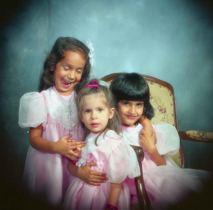 [Portrait of three unidentified children]