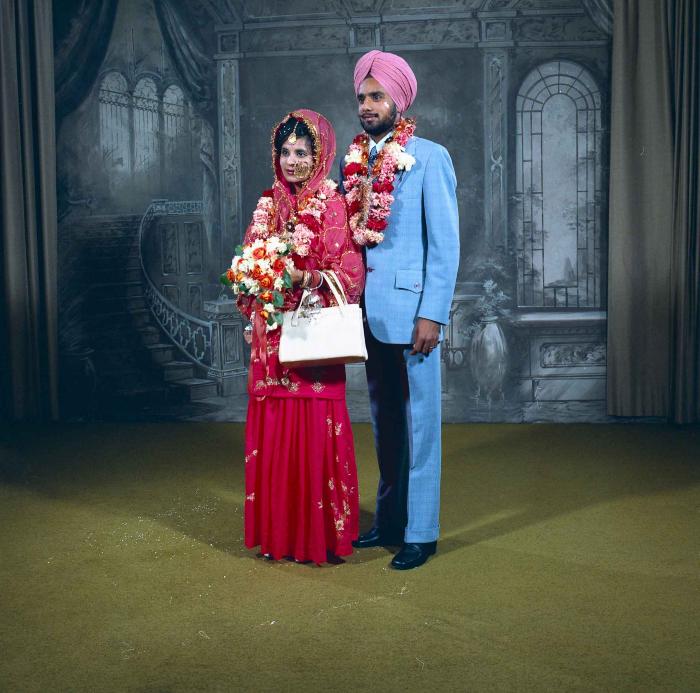 [Portrait photo of Braich and unidentified  bride]