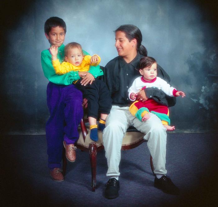 [Group photo of four children]