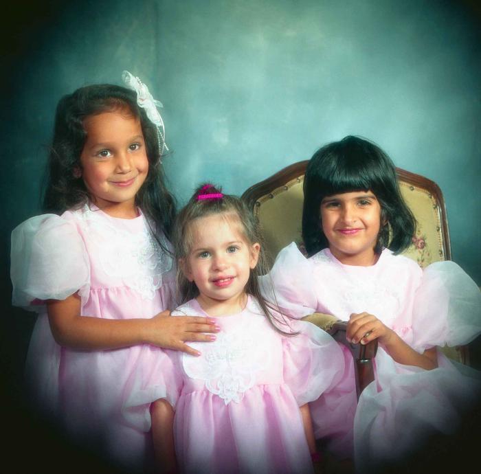 [Portrait of three unidentified children]