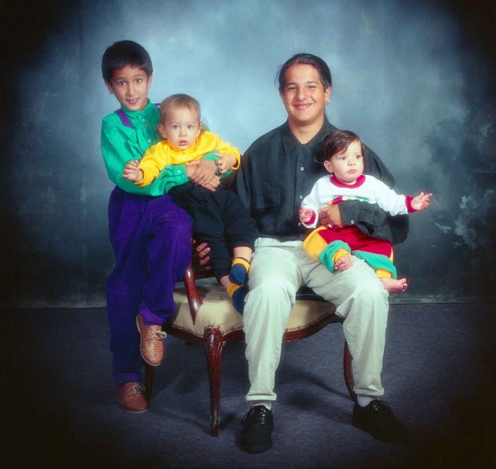 [Group photo of four children]