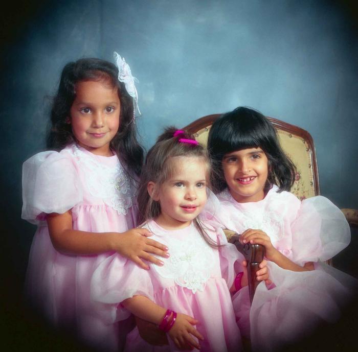 [Portrait of three unidentified children]