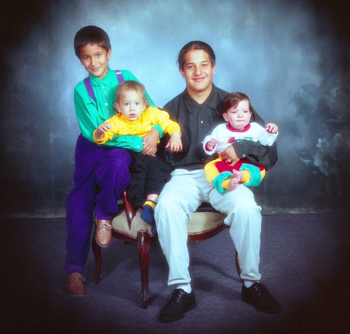 [Group photo of four children]