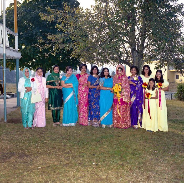 [Group photo of Baljit Gill with unidentified  women]