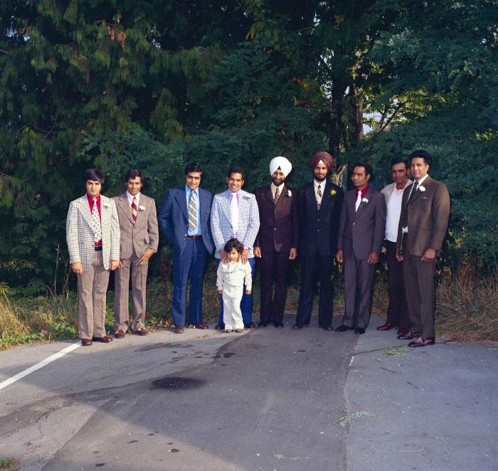 [Group photo of Balbir Khangura with family friends]