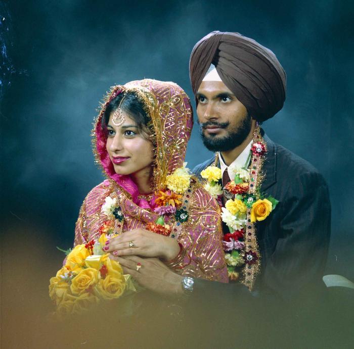 [Portrait of Balbir Khangura and Baljit Gill]