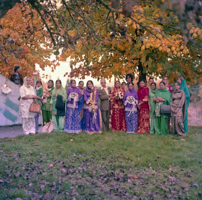 [Group photo of unidentified  bride with wedding guests]