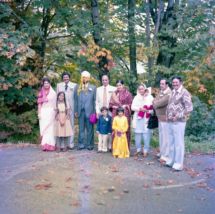 [Group photo of Inderjit Cheema with wedding guests]