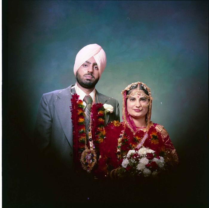 [Portrait of Inderjit Cheema and unidentified  bride]
