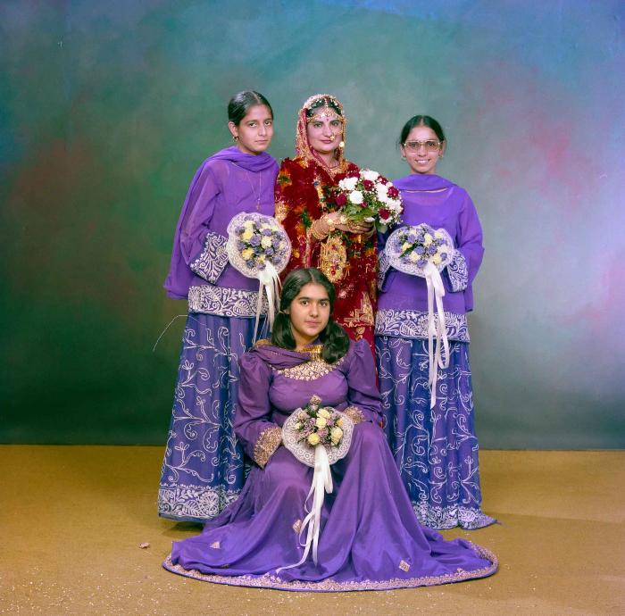 [Group photo of unidentified  bride with wedding guests]