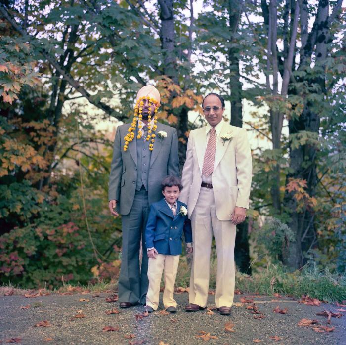 [Portrait of Inderjit Cheema with an unidentified man and a small child]