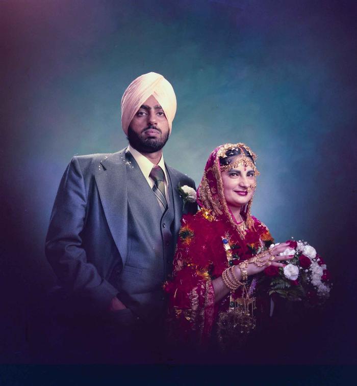 [Portrait of Inderjit Cheema and unidentified  bride]