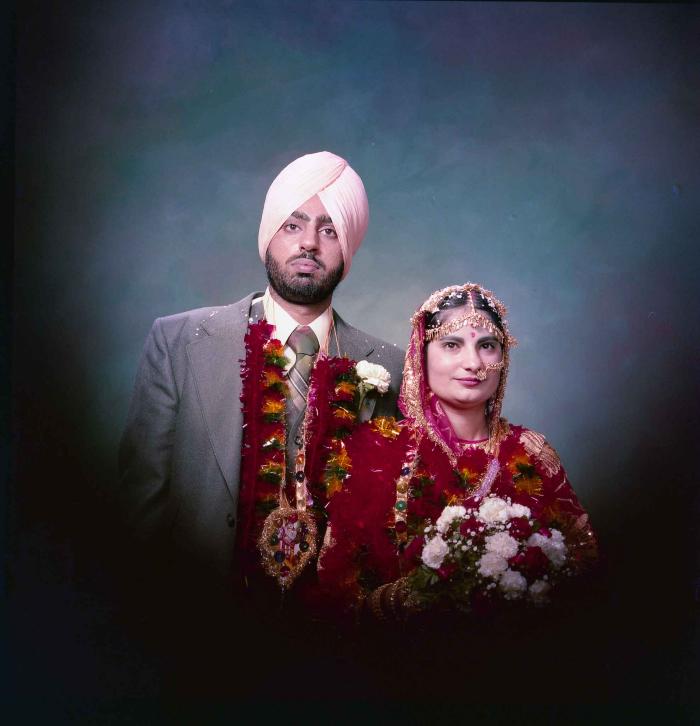[Portrait of Inderjit Cheema and unidentified bride]