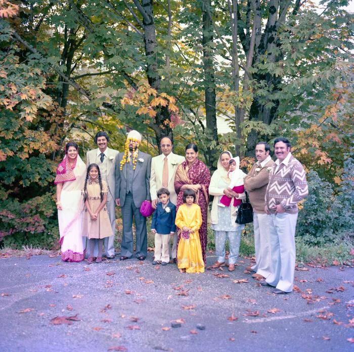 [Group photo of Inderjit Cheema with wedding guests]