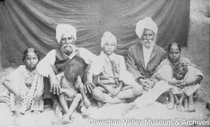 [Group of two unidentified Sikh men, three unidentified Sikh young adults and two unidentified children]