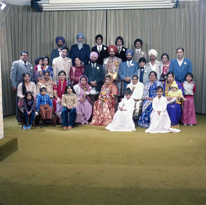 [Group photo of Parm Cheema and Swaren Dhaliwal with family members]