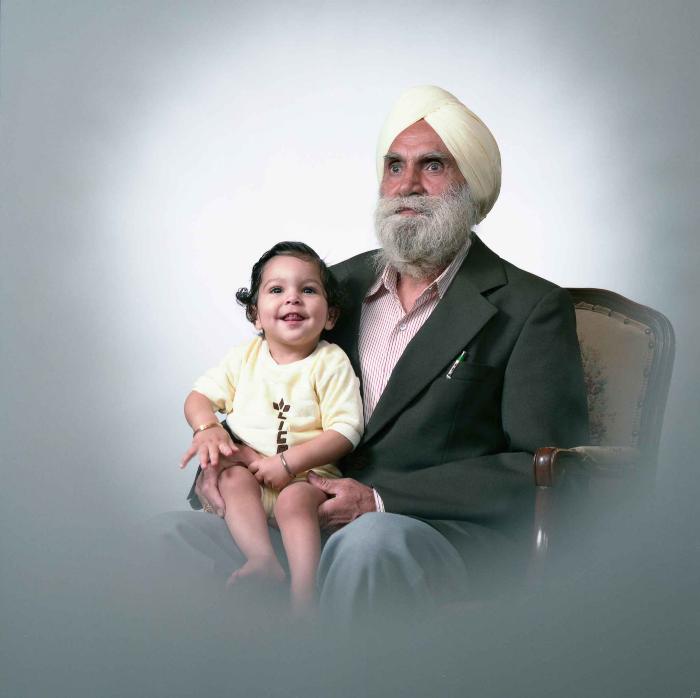 [Portrait of unidentified man with a child]