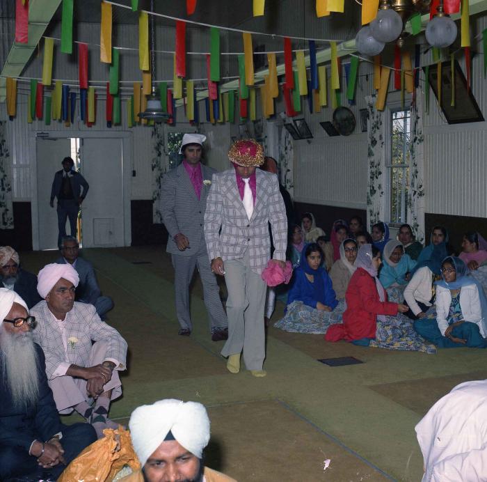 [Group photo of Kehar S. Cheema with wedding guests]