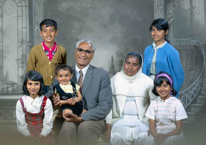 [Group photo of Gurdip Singh Chahal with his family]