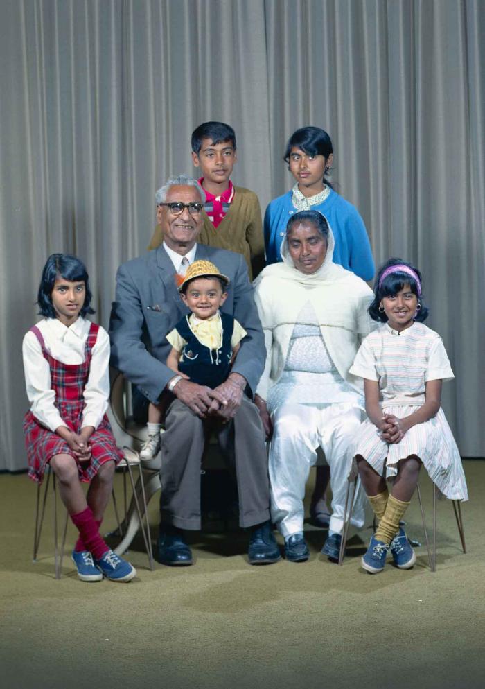 [Group photo of Gurdip Singh Chahal with his family]