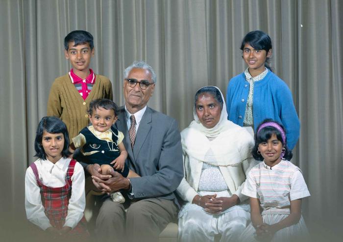 [Group photo of Gurdip Singh Chahal with his family]