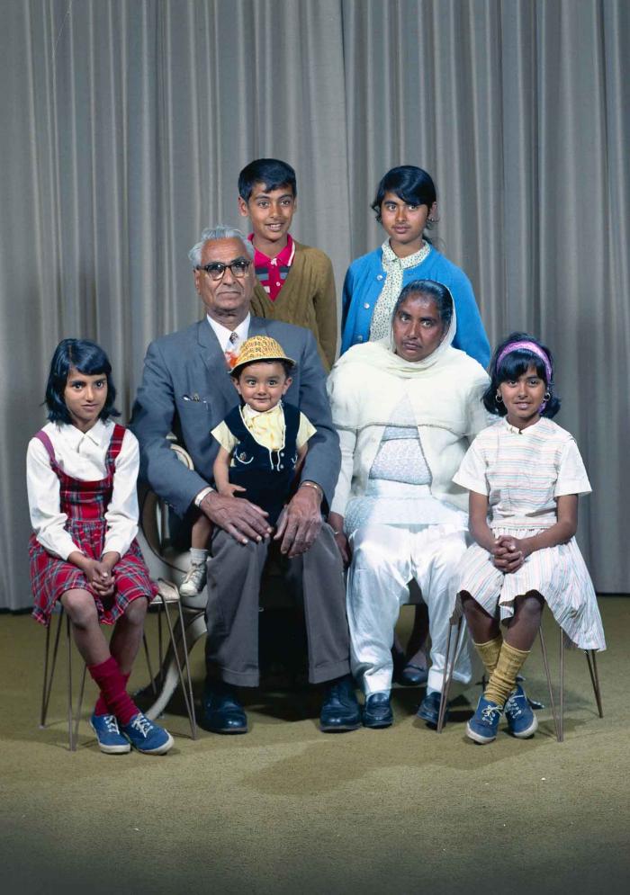 [Group photo of Gurdip Singh Chahal with his family]