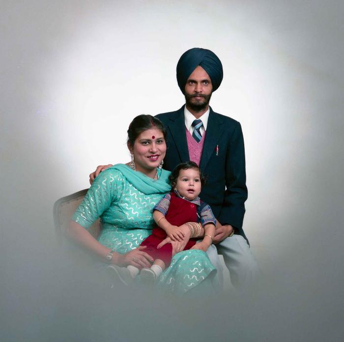 [Portrait of Kesar Singh Chera and an unidentified woman with a child]